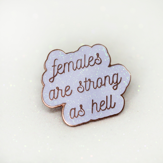 Females are strong as hell hard enamel pin in white glitter and rose gold. - Haveago Crafter